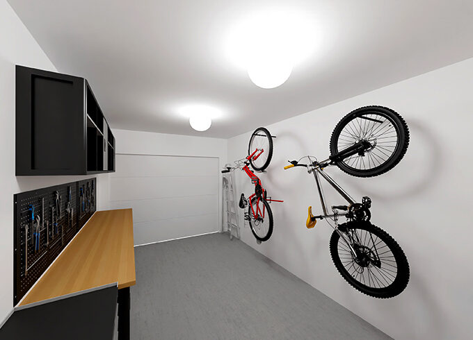 Garage avec deux vélos et un établi